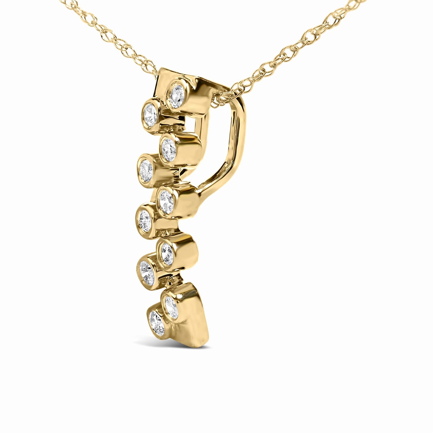 Close-up angled view of a yellow metal necklace pendant with a vertical row of round white gemstones in bezel settings.
