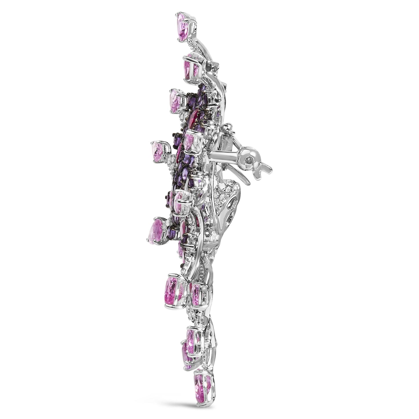 Side view of a white brooch featuring pink pear-shaped gemstones, purple round pave-set gemstones, red pear-shaped gemstones, and white round pave-set gemstones.