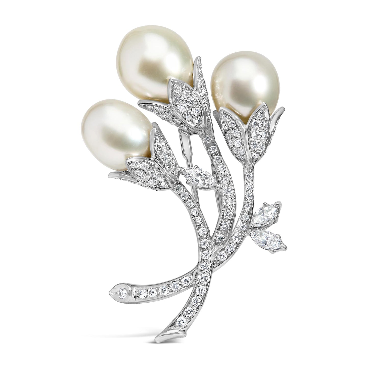 White metal brooch shaped like three flower buds with white round pave-set gemstones on stems and leaves, and three large pearl-like accents, shown from a front angle.