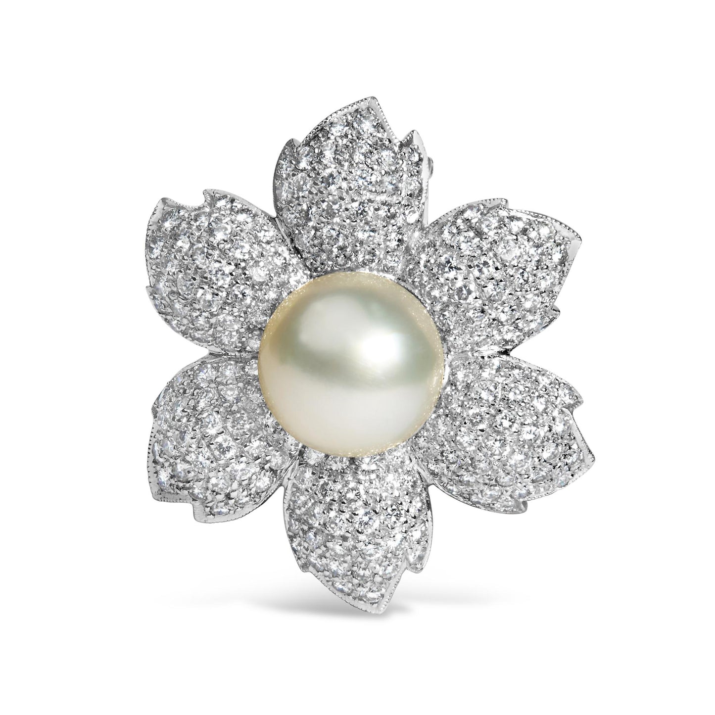 Brooch in flower shape with white metal petals pave set with round white gemstones and a central large white gemstone, front-facing angle.