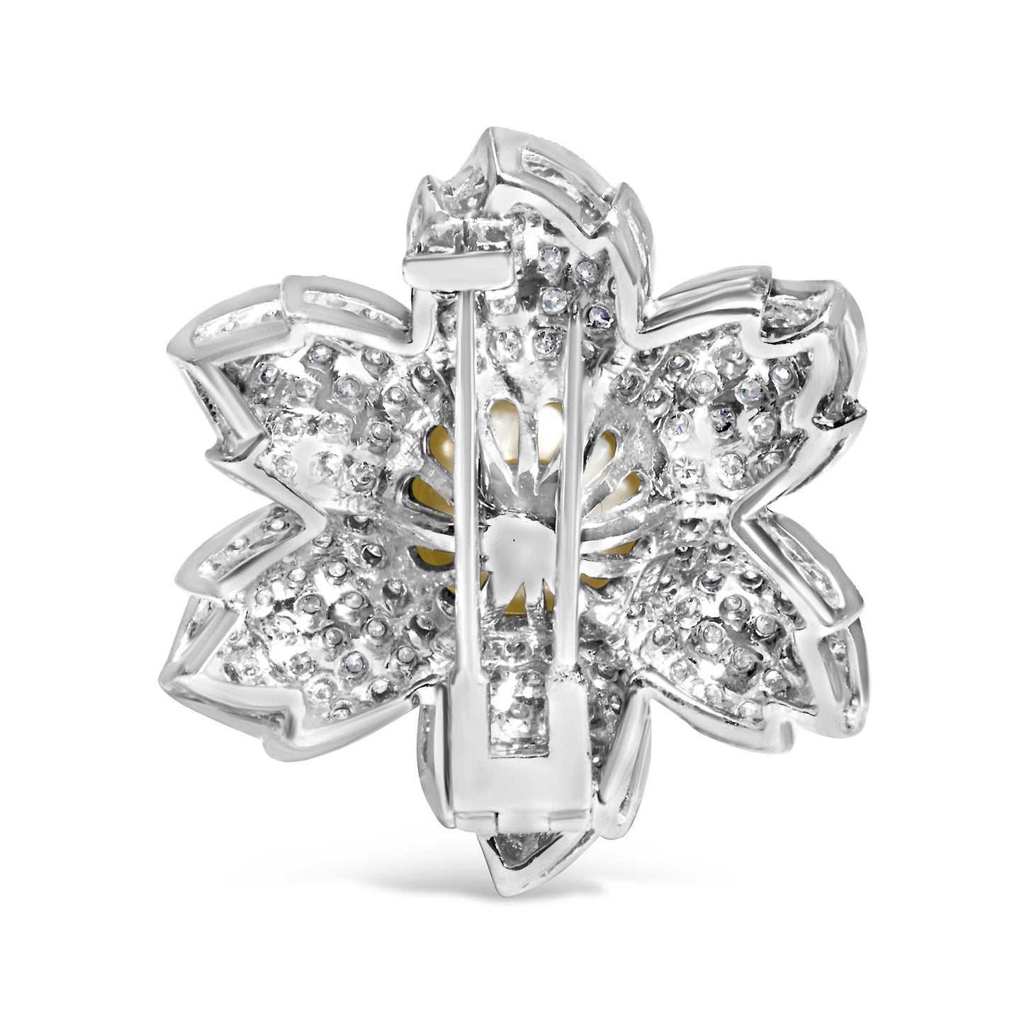Back view of a white metal flower-shaped brooch with round pave-set white gemstones, shot from a straight-on angle.