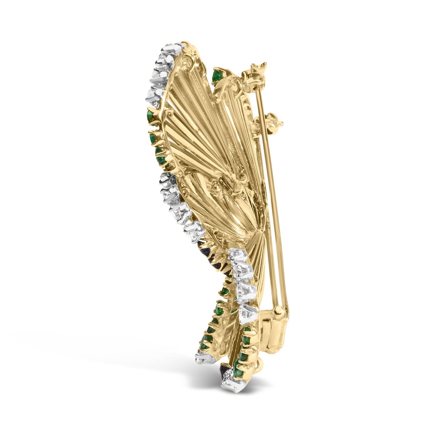 Side angle view of a yellow metal butterfly-shaped brooch adorned with round white, blue, and green gemstones in 4-prong settings on the edges.