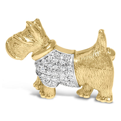 Side view of a yellow metal dog-shaped brooch with a pave setting of round white gemstones on its torso.