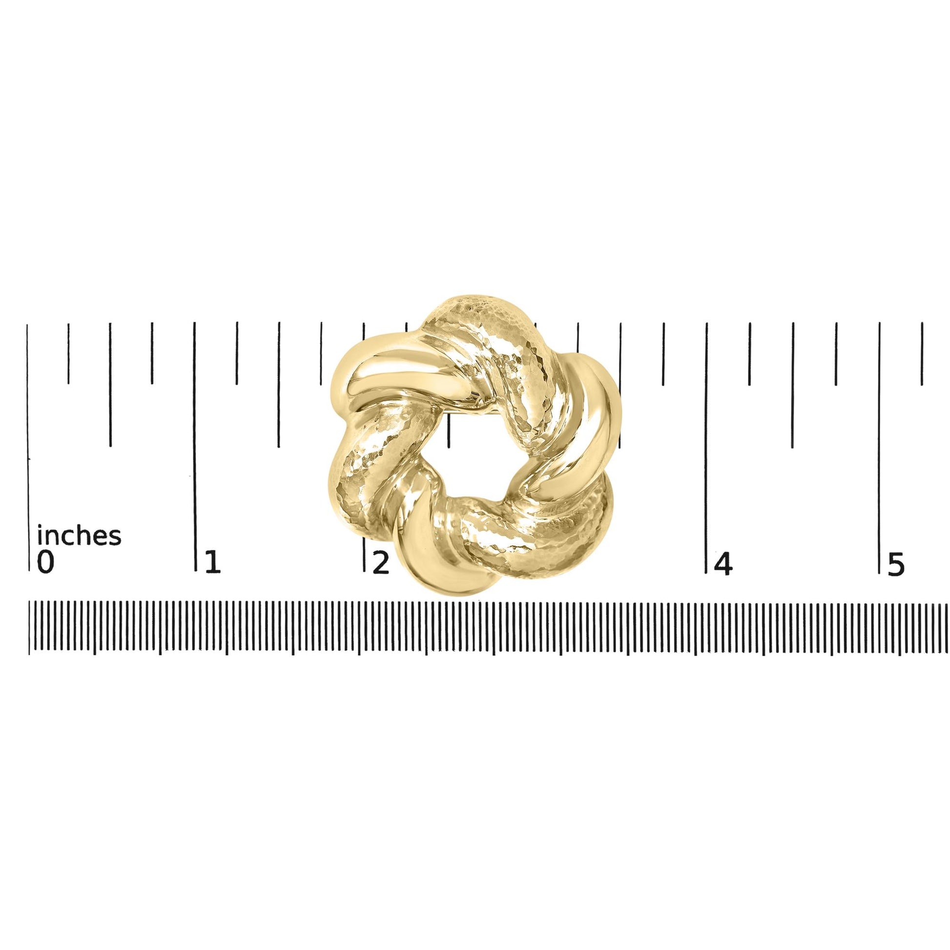 Yellow metal brooch with intertwined twisted loops and textured detail, shown from a top-down view on a scale.