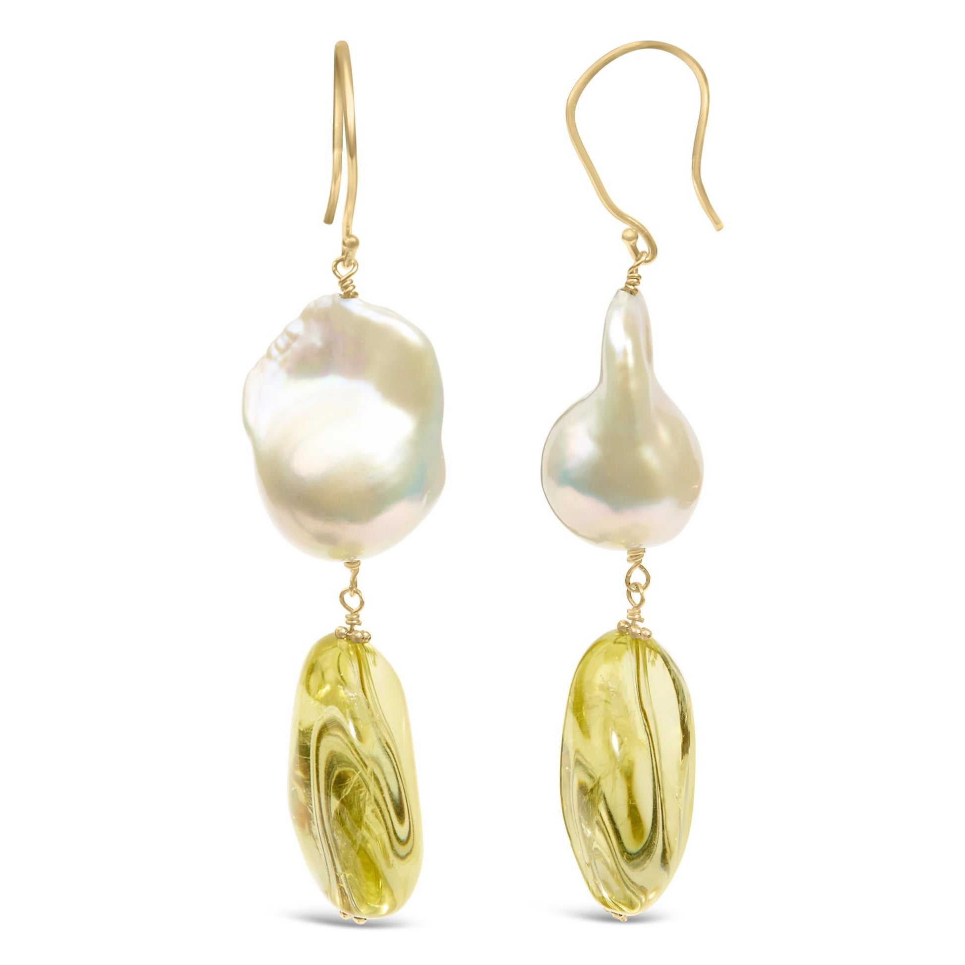 Front-facing view of a pair of yellow metal earrings with irregularly shaped white gemstones at the top and elongated yellow gemstones hanging below.