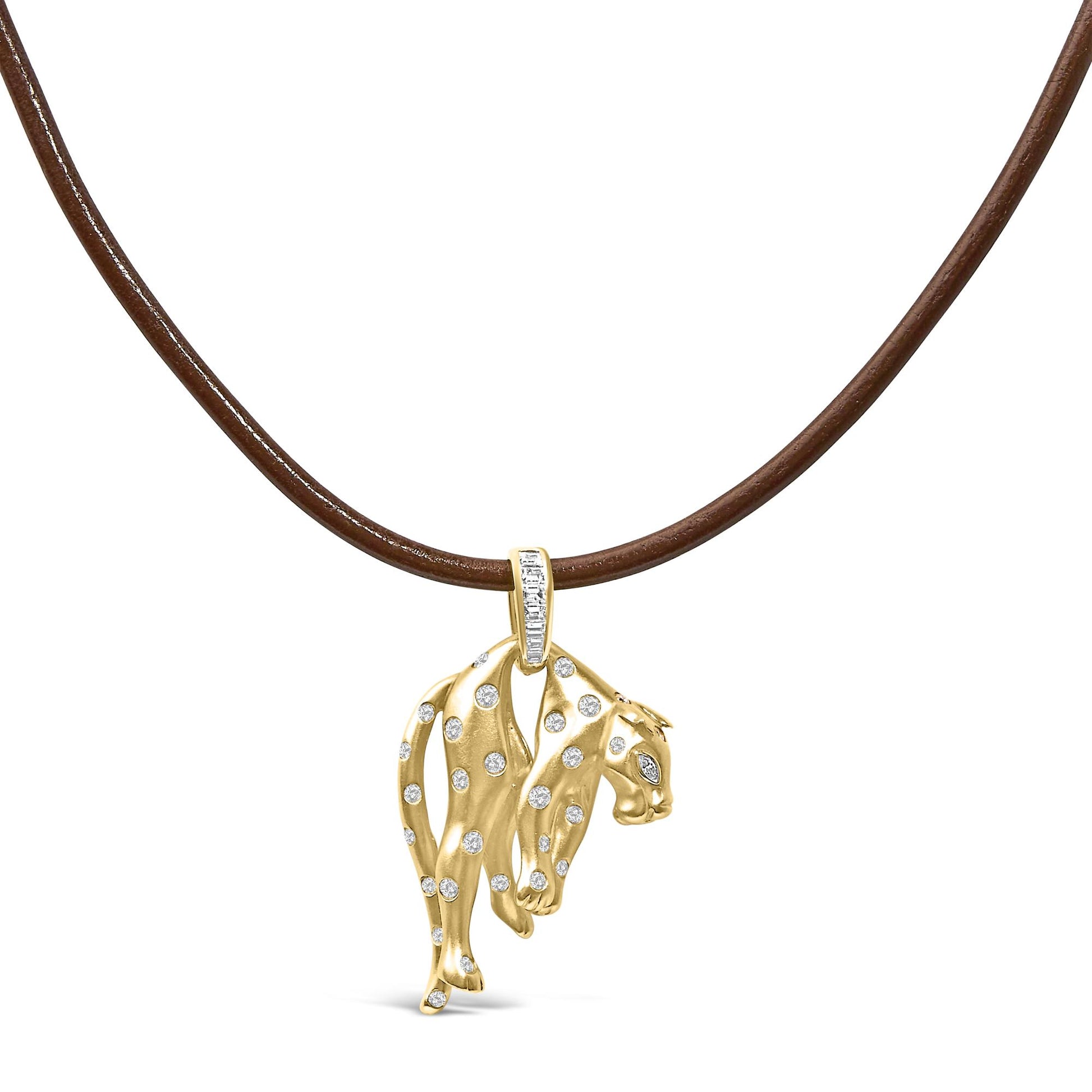 Front-facing shot of a yellow metal necklace pendant shaped like a leopard with scattered round white gemstones and a white baguette gemstone set bail, displayed on a brown cord.