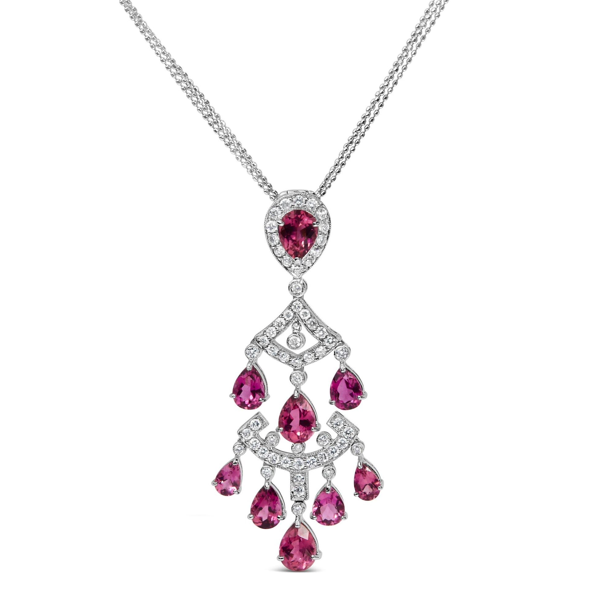 White metal necklace with a pendant featuring pear-shaped pink gemstones and round white gemstones in prong settings, shown from the front.