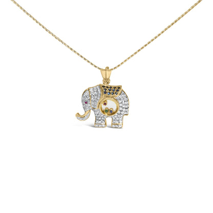 Front view of yellow metal elephant-shaped necklace pendant with white pave-set gemstones covering the body, blue pave-set gemstones on the back, and small bezel-set red and green gemstones inside a circular compartment in the center, shown against a white background.