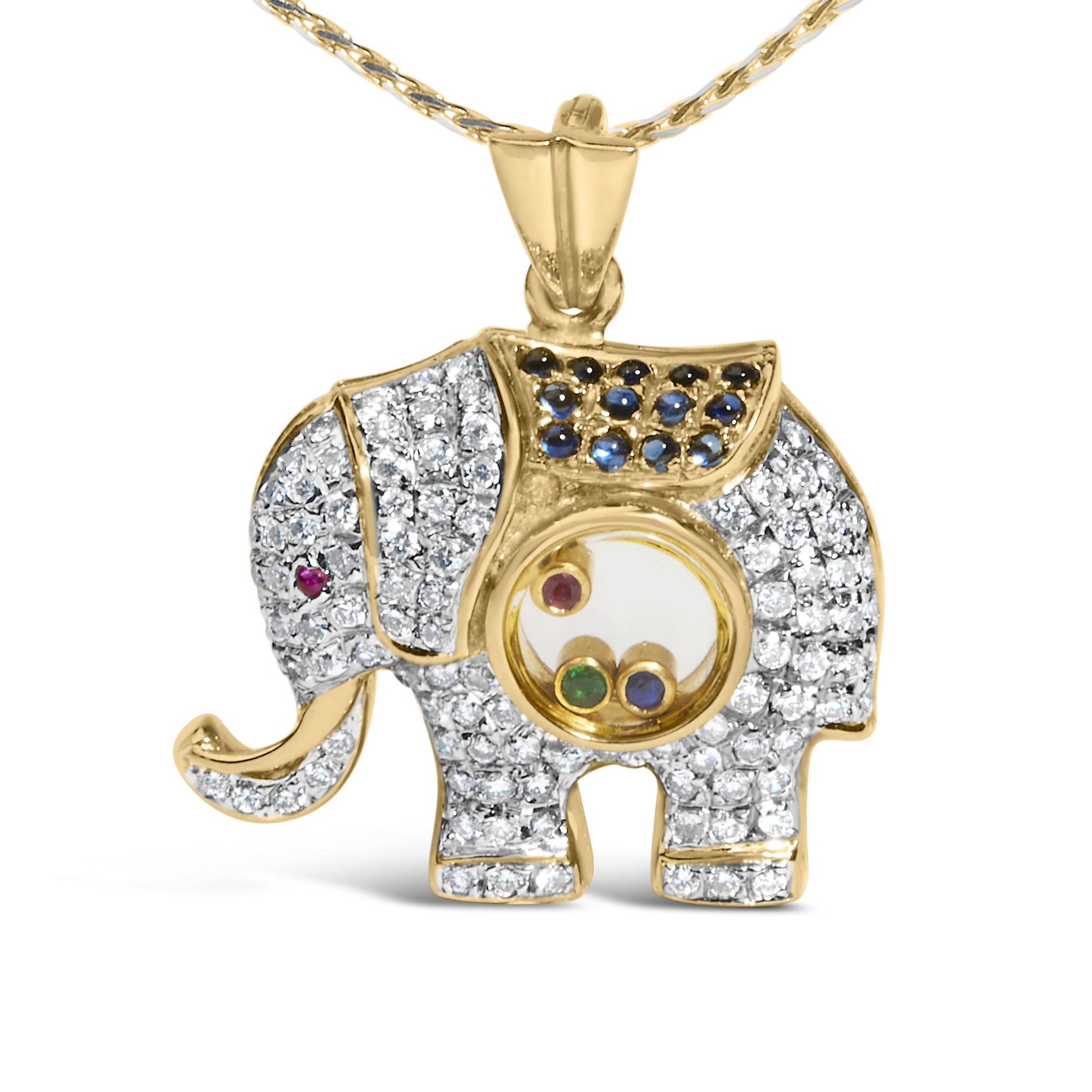 Front-facing close-up of a yellow metal elephant-shaped necklace pendant adorned with pave-set white gemstones, blue gemstones on the back, bezel-set red and green gemstones as accents, and a circular transparent section containing loose red, green, and blue gemstones.