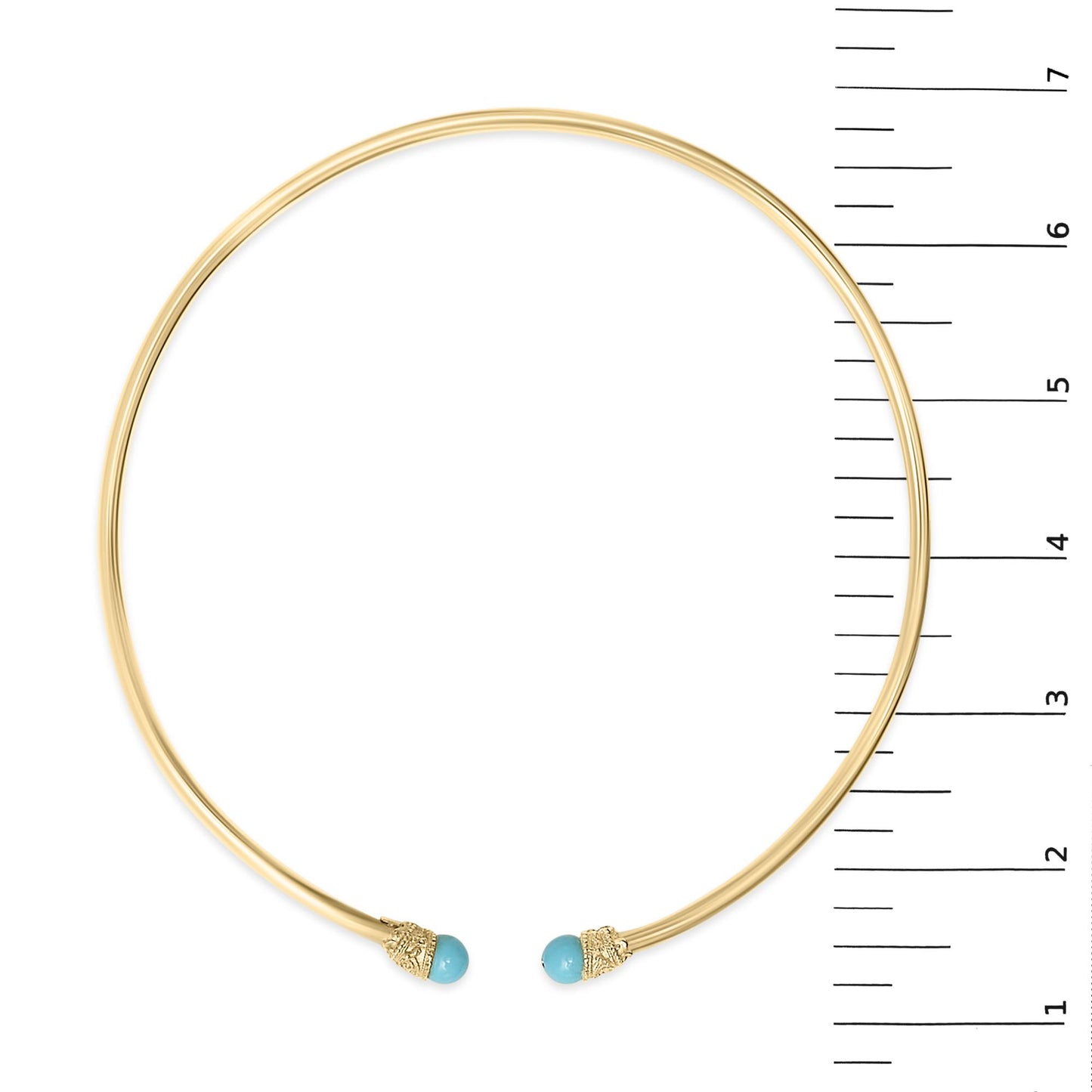 Top-down view of an open-ended yellow necklace with round blue gemstones on each end, shown on a scale.