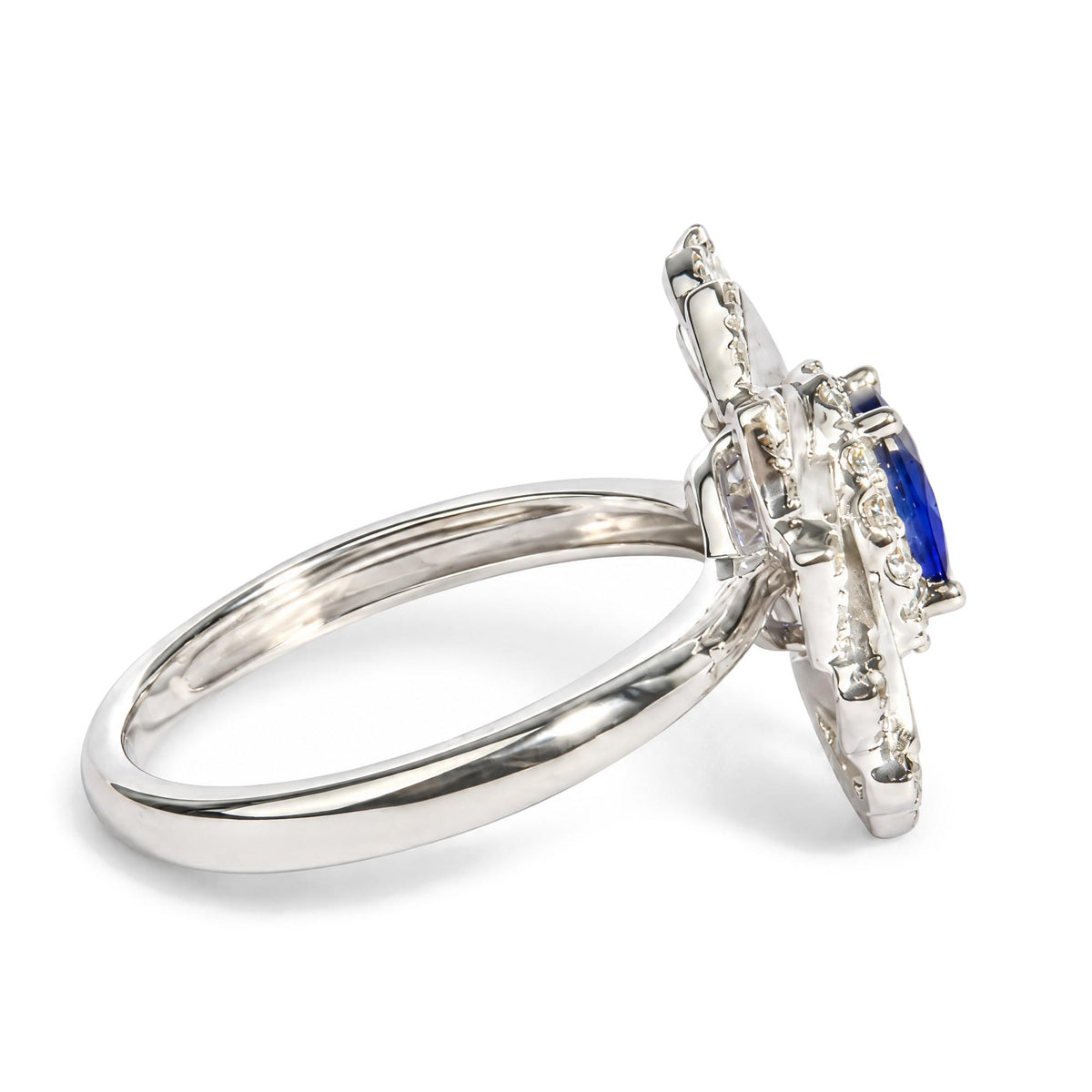 14K White Gold Oval Blue Sapphire and 1/5 Cttw Diamond Sunburst Halo Cocktail Ring