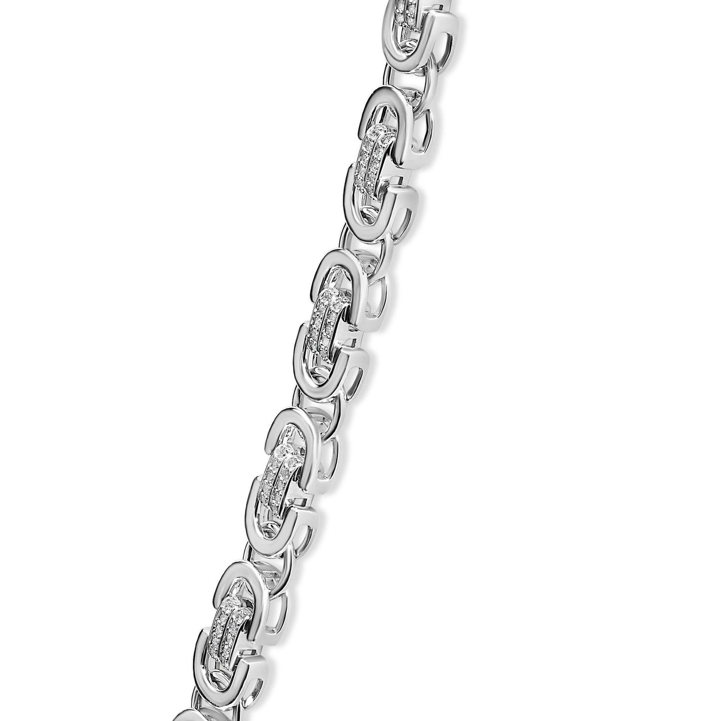 Close-up angled view of a white necklace featuring linked sections with embedded round prong-set white gemstones.