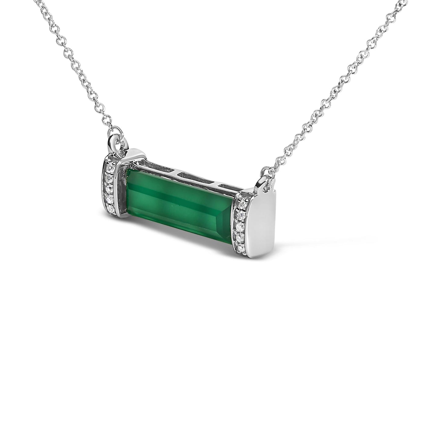 Close-up front angle of a white necklace with a horizontal rectangular green gemstone in a channel setting, flanked by white round gemstones in a pave setting on each side.