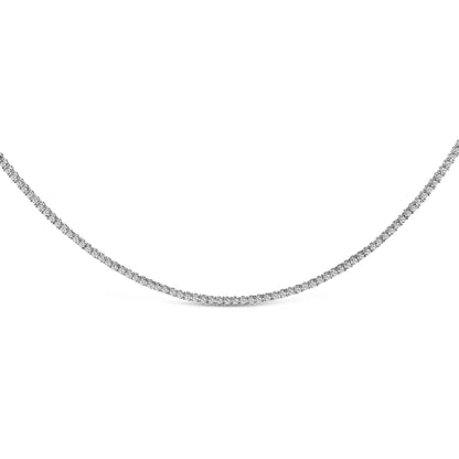 White metal necklace featuring a curved line of round white gemstones in prong settings, shown from the front on a white background.