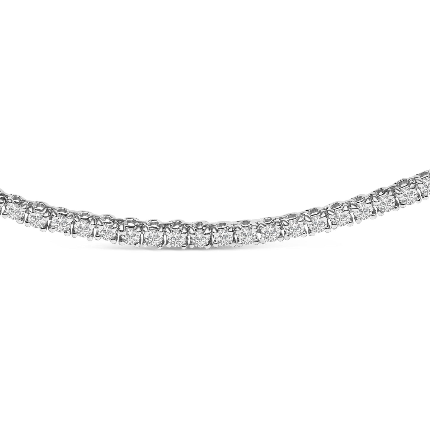 Close-up front angle of a white necklace with round white gemstones in prong settings.