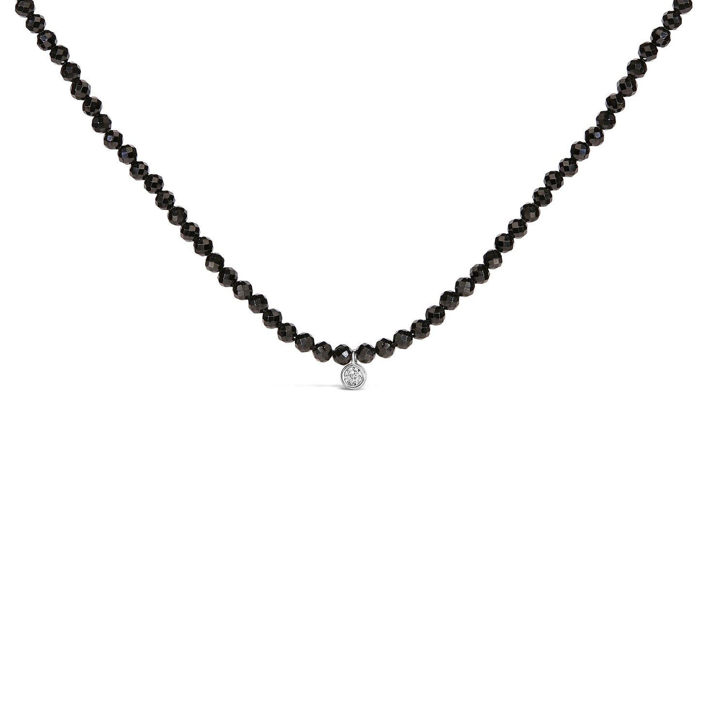 Close-up front view of a white necklace with round black gemstones forming the chain and a single round white gemstone pendant in the center.