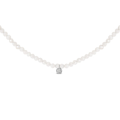 White gemstone round bead necklace with a small white gemstone pendant in a white setting, shown against a white background from a front angle.