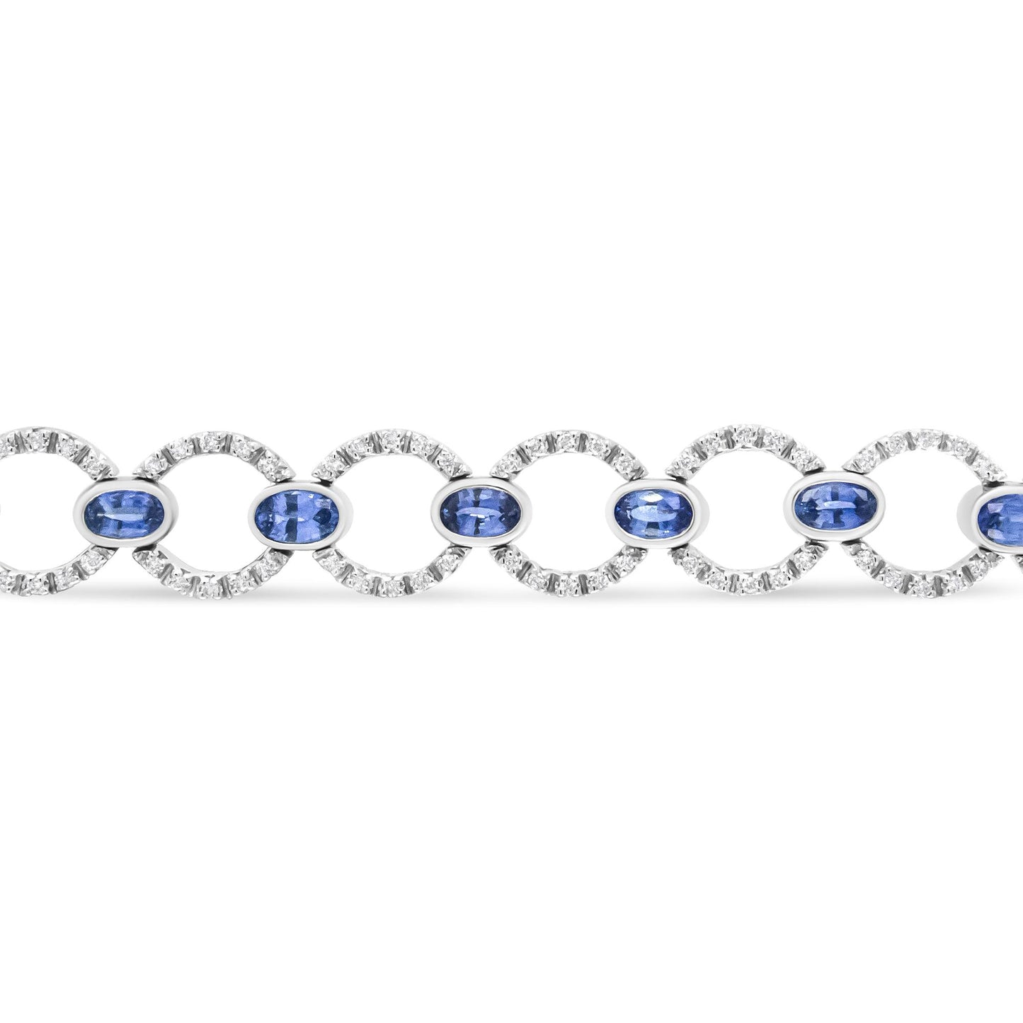 Straight-on view of a white metal bracelet featuring alternating circular links set with round white gemstones and oval blue gemstones in bezel settings.