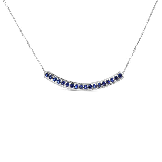 Front view of .925 sterling silver created blue and white sapphire 3 stone curved swirl necklace