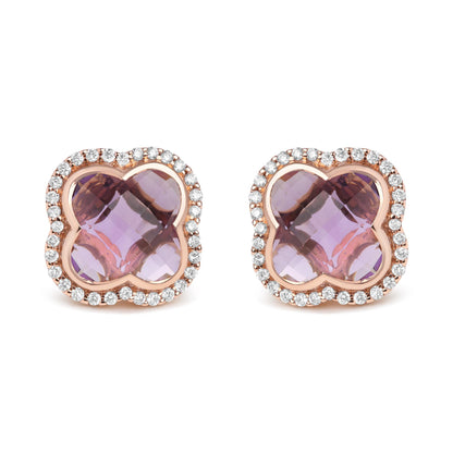 Pair of rose-colored stud earrings with central purple gemstones in a four-petal shape, surrounded by a halo of round white gemstones, shown from a front angle on a white background.