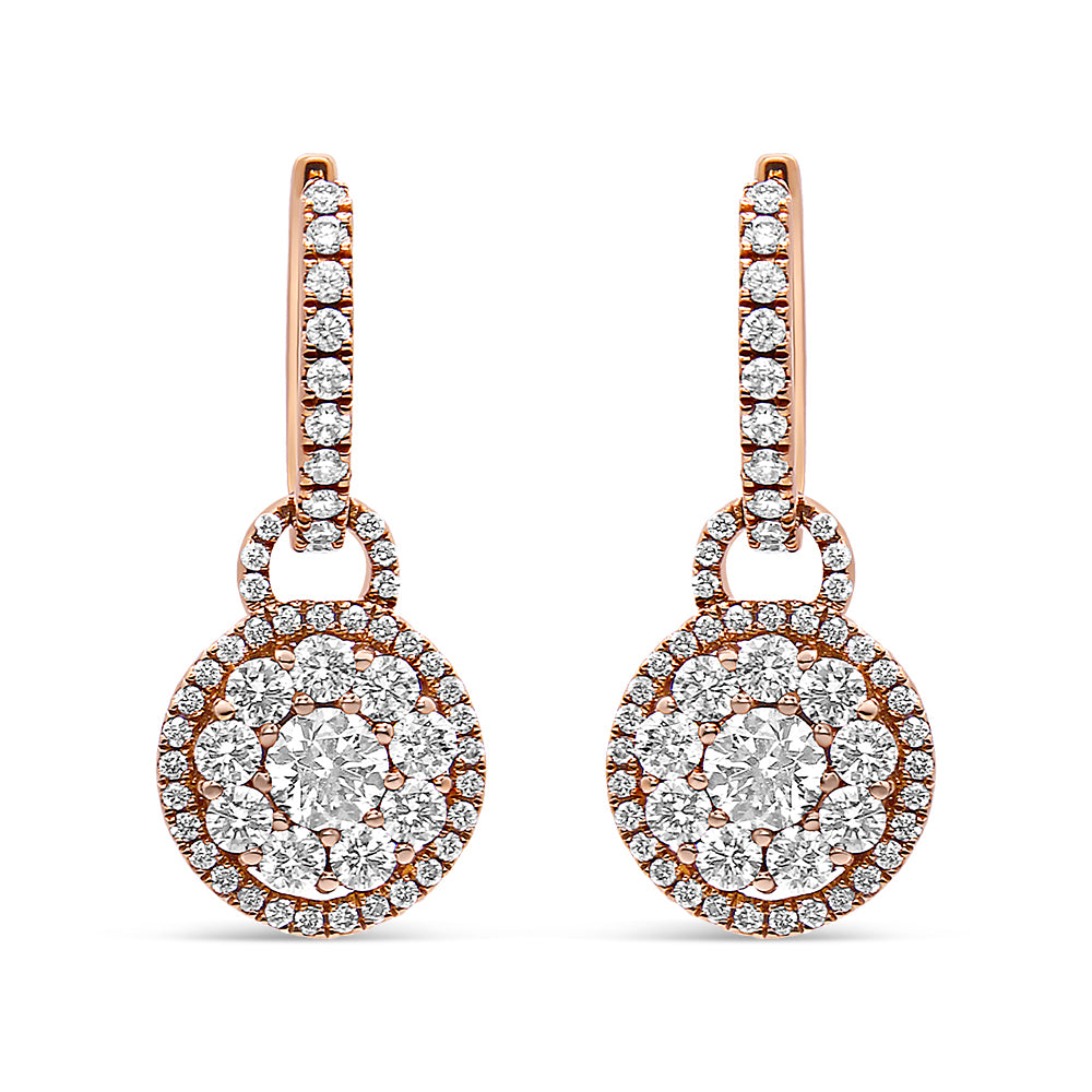 Front view of a pair of rose metal drop earrings featuring round white gemstones arranged in a circular cluster design with additional gemstones along the hooks.