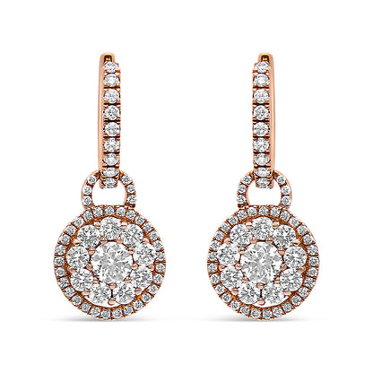 Front view of a pair of rose metal drop earrings featuring round white gemstones arranged in a circular cluster design with additional gemstones along the hooks.