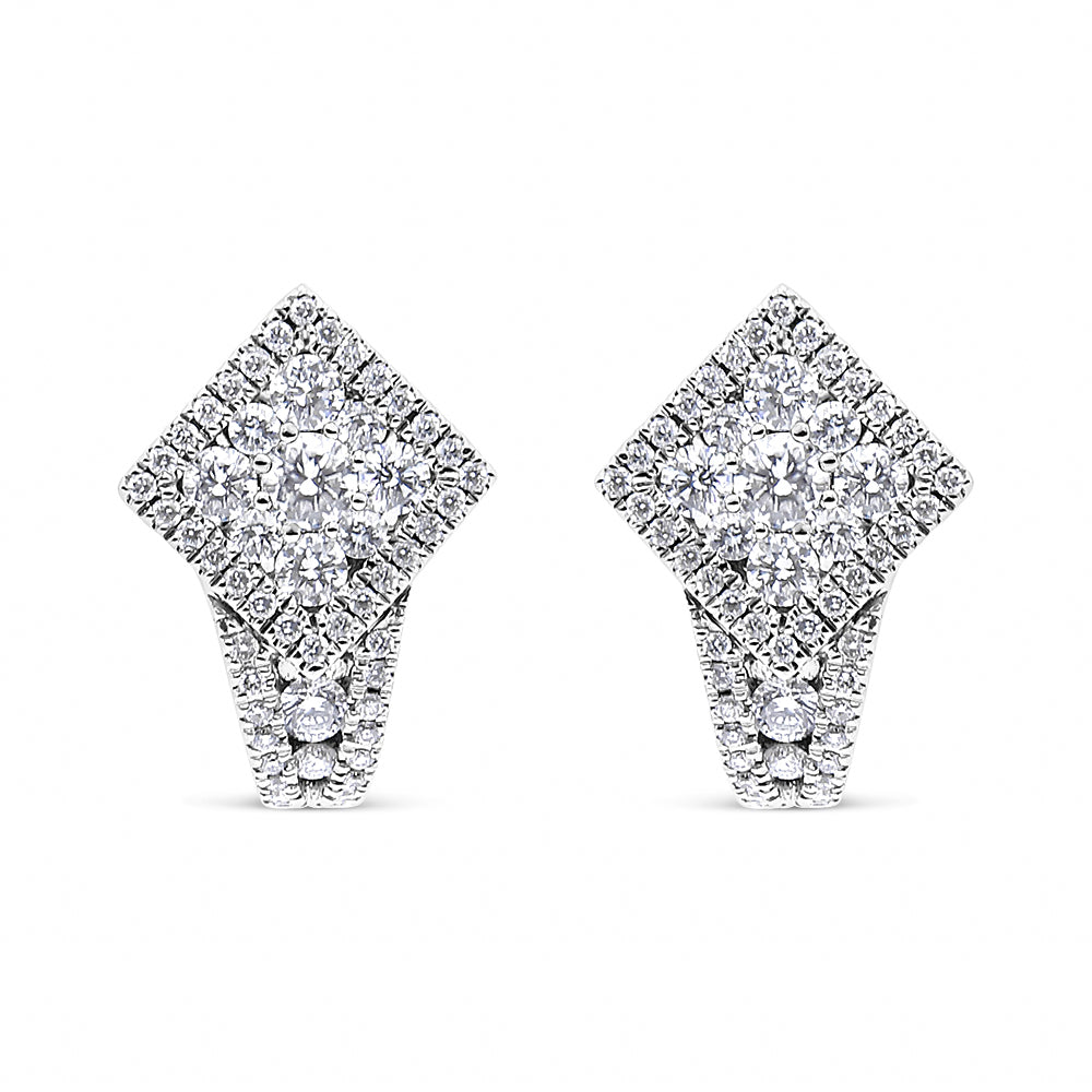 Front-facing shot of white metal earrings with a diamond-shaped cluster of round white gemstones in shared prong settings, featuring additional smaller round white gemstones extending downward.