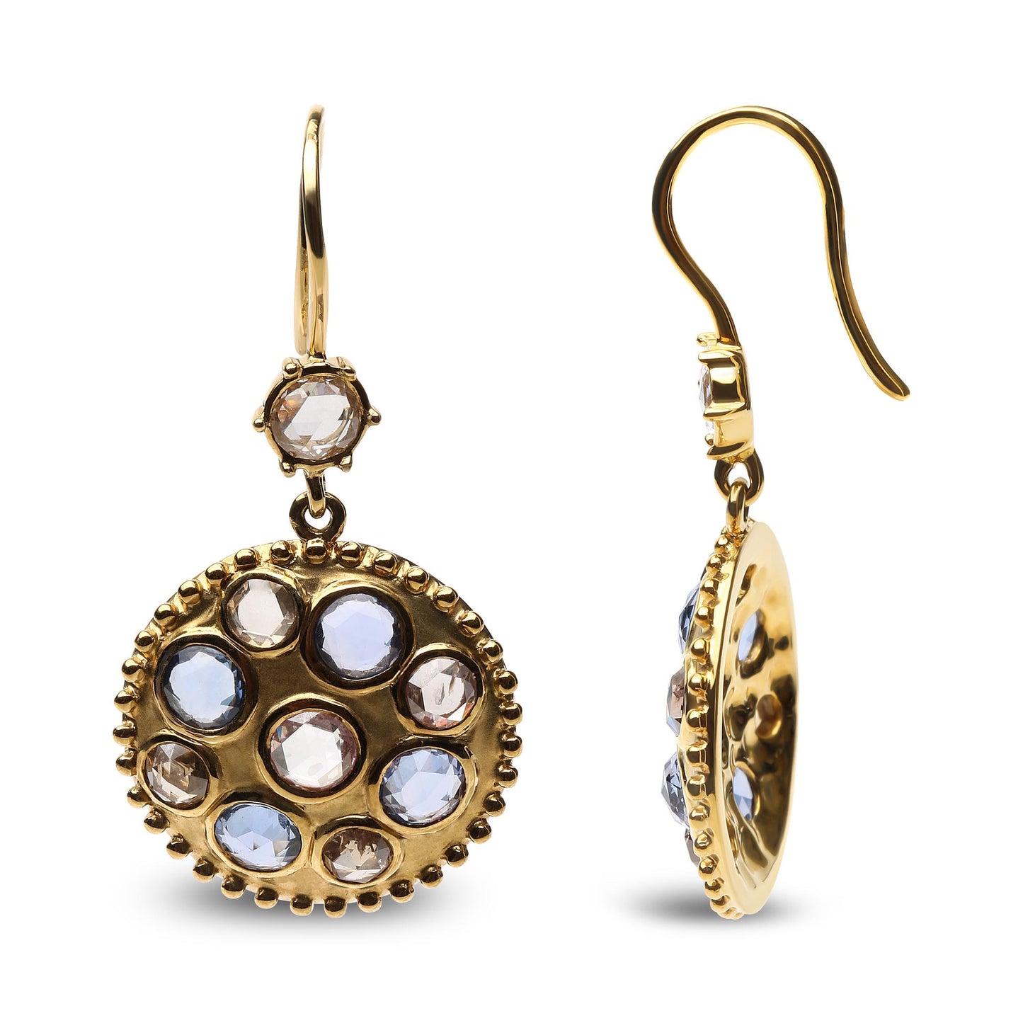 Front and side angle of yellow metal round drop earrings featuring round bezel-set blue and brown gemstones.