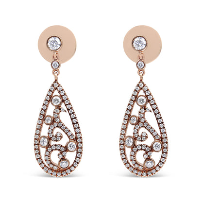 Front-facing view of a pair of rose metal drop earrings with intricate openwork teardrop shapes adorned with multiple round white gemstones in prong settings.