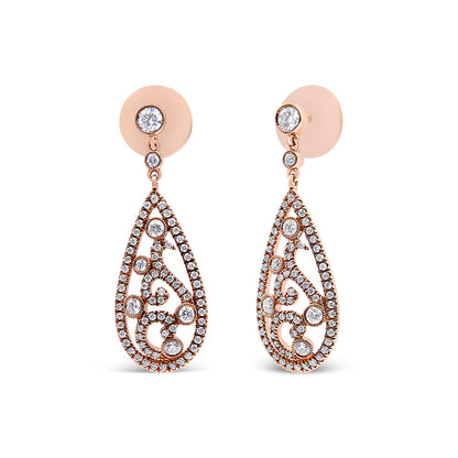 Front-facing image of a pair of rose-colored metal teardrop earrings adorned with multiple round white gemstones in prong settings, shown on earring backings.