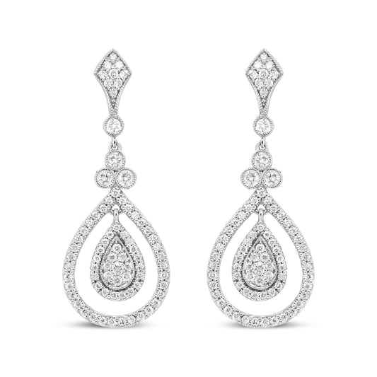 Front view of white metal drop earrings with teardrop and diamond-shaped sections adorned with multiple white gemstones in bezel and prong settings.