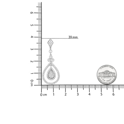 White metal drop earring with teardrop shape, featuring multiple round white gemstones in bezel and prong settings, shown on a scale from a front angle.