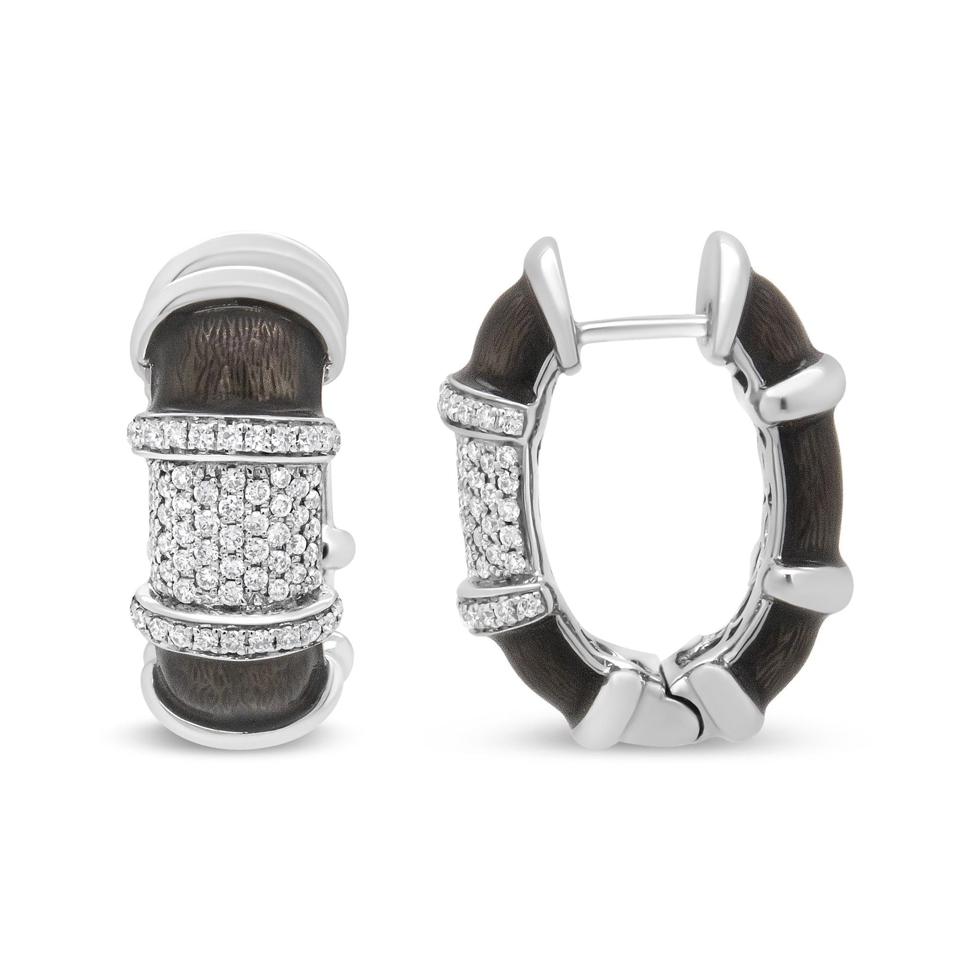 Front and side view of white metal hoop earrings with dark textured inlay and three rows of small white round gemstones in prong settings around the center section.