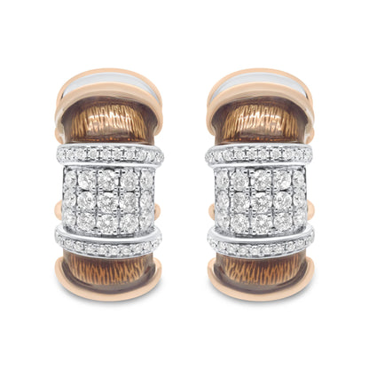 Pair of earrings shown from the front, featuring white and rose metal with clusters of round white gemstones in prong settings.