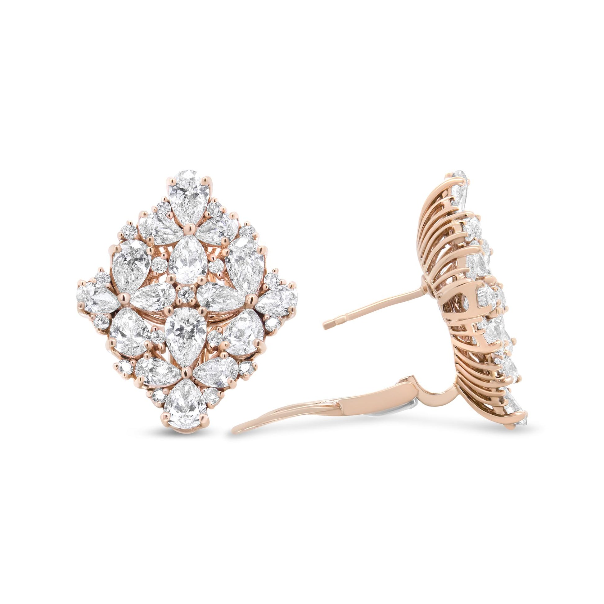 Front and side view of rose-colored metal earrings with pear-shaped and round white gemstones in prong settings, shot on a white background.