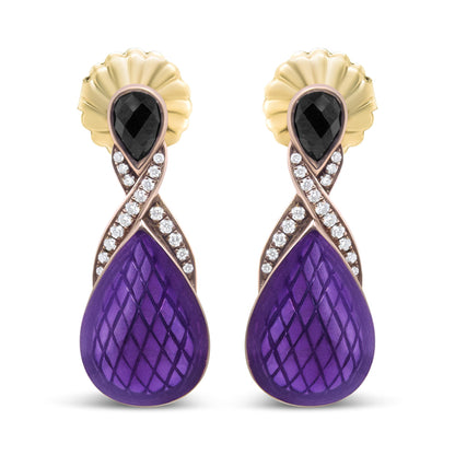 Front-facing shot of white metal earrings featuring a black pear-shaped gemstone at the top, crossing lines of small white round gemstones in a pave setting, and a large purple teardrop-shaped element with a textured pattern at the bottom.