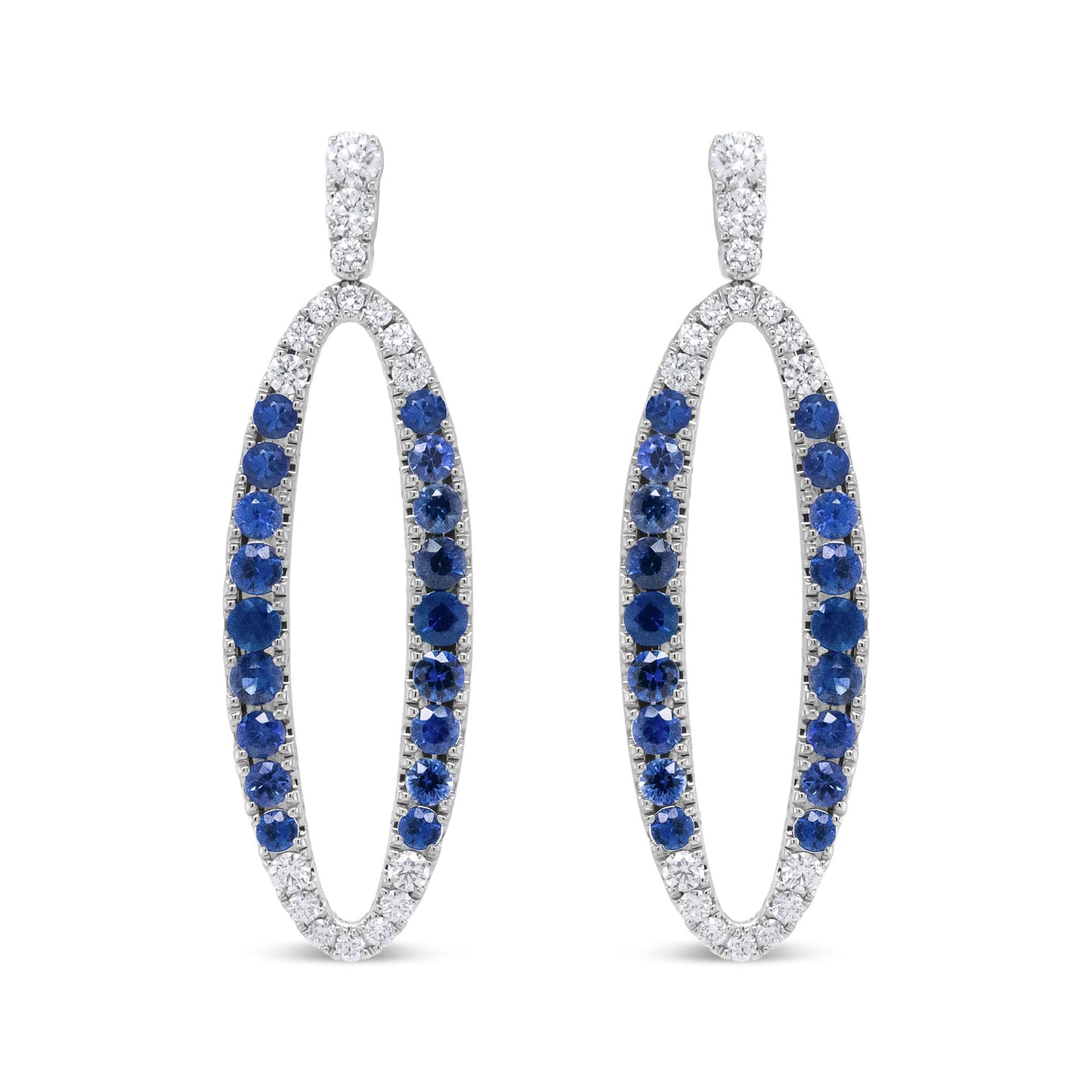 Front view of white metal oval-shaped earrings with alternating white and blue gemstones in prong settings.