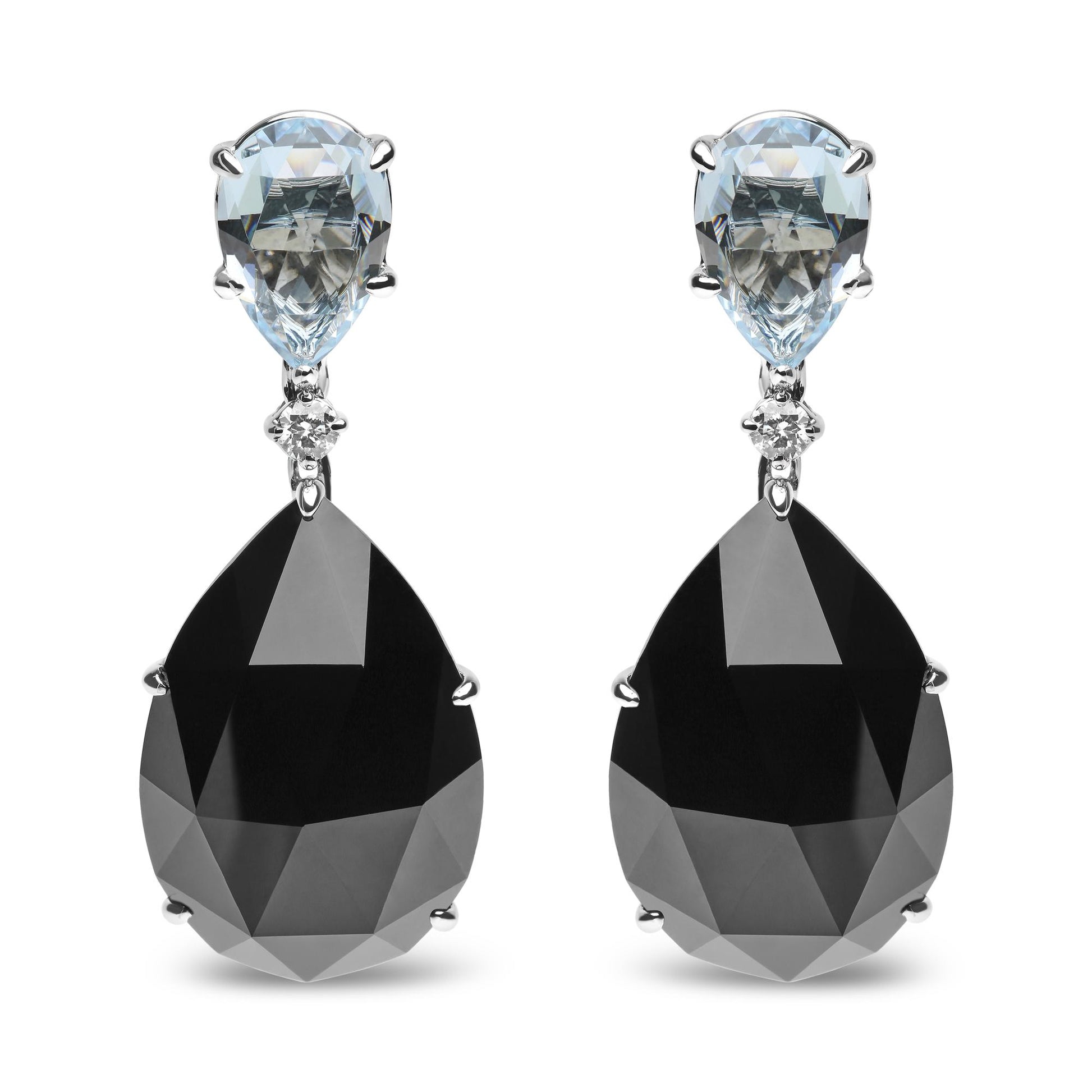 Front view of white metal drop earrings with pear-shaped blue gemstones at the top, small round white gemstones in the middle, and large pear-shaped black gemstones at the bottom.