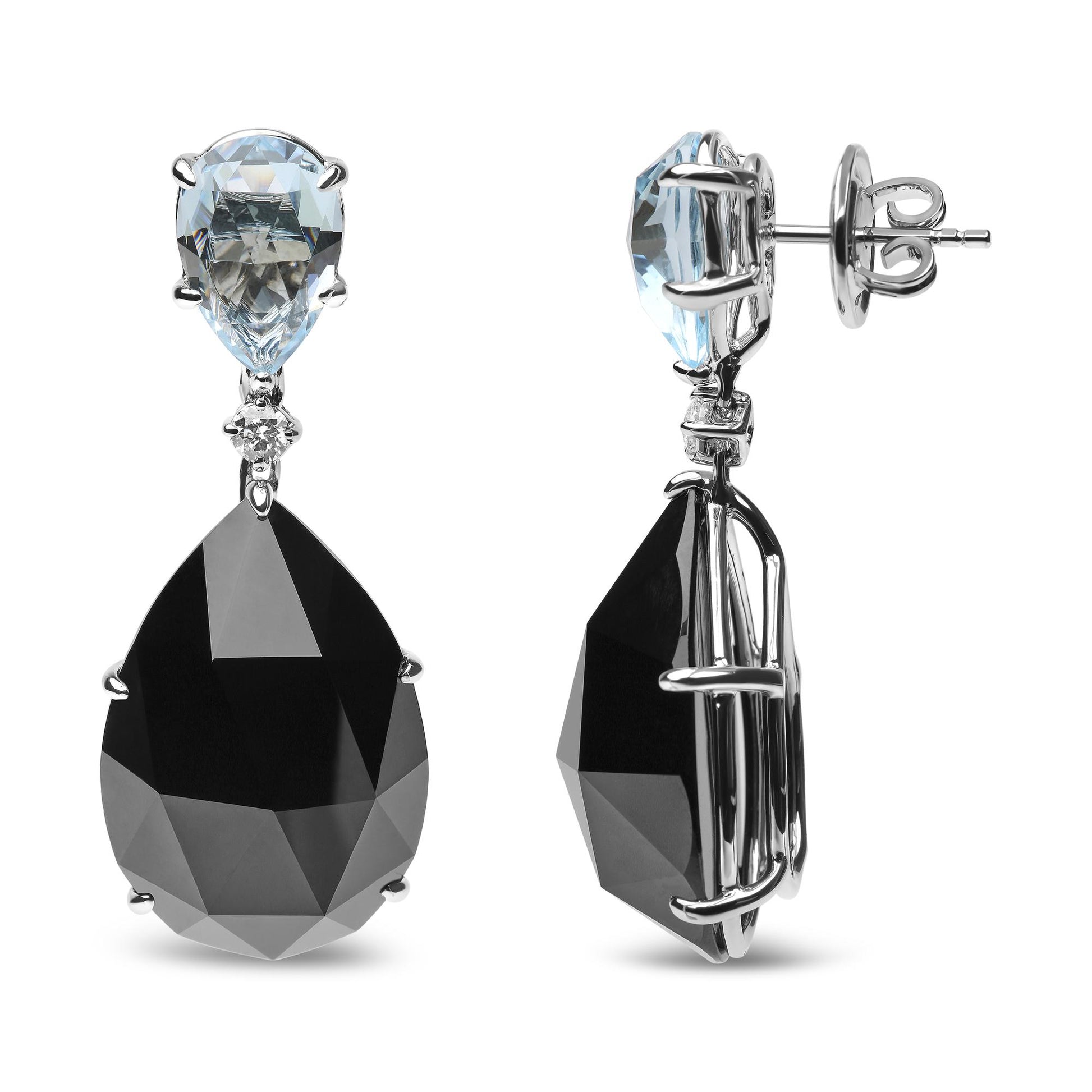 Pair of white metal earrings with a pear-shaped blue gemstone at the top, a small round white gemstone below it, and a larger pear-shaped black gemstone hanging, shown from front and side angles.