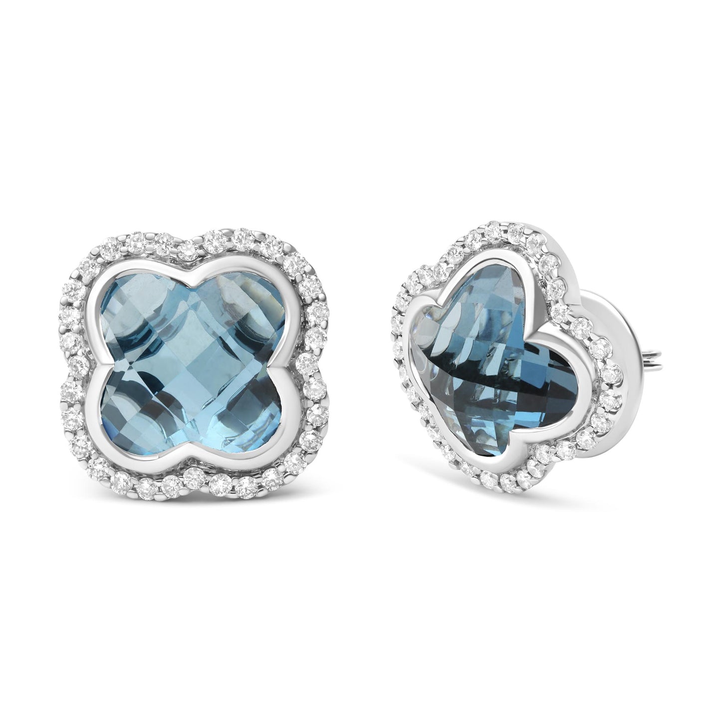 Pair of white metal earrings with blue gemstones in a floral shape, surrounded by round white gemstones in prong settings, shown from front and angled side views.