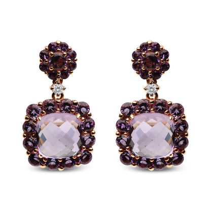 Front-facing pair of rose-colored earrings featuring cushion-shaped light purple gemstones surrounded by round dark purple gemstones, with round pink gemstones and a small round white gemstone near the post.