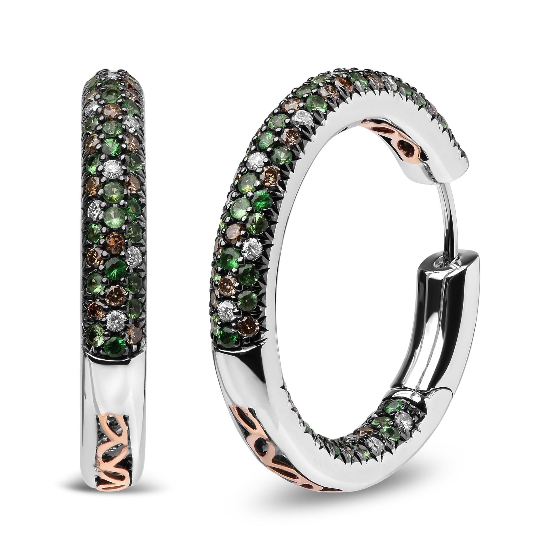 Close-up front and side view of white metal hoop earrings adorned with small round green, brown, and white gemstones in prong settings, with a hinged clasp.