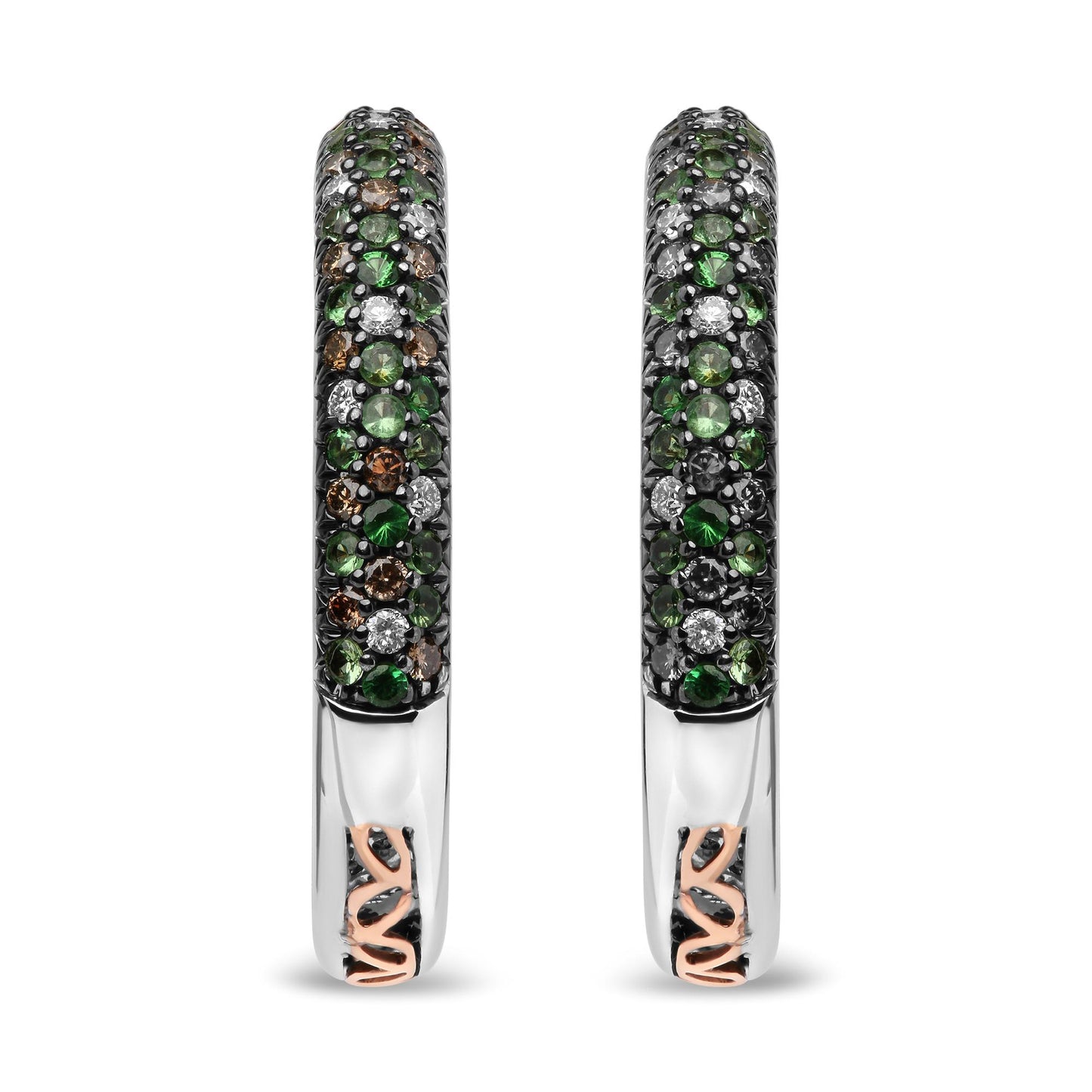 Front-facing close-up of white metal hoop earrings set with round green gemstones, round brown gemstones, and round white gemstones in prong settings.