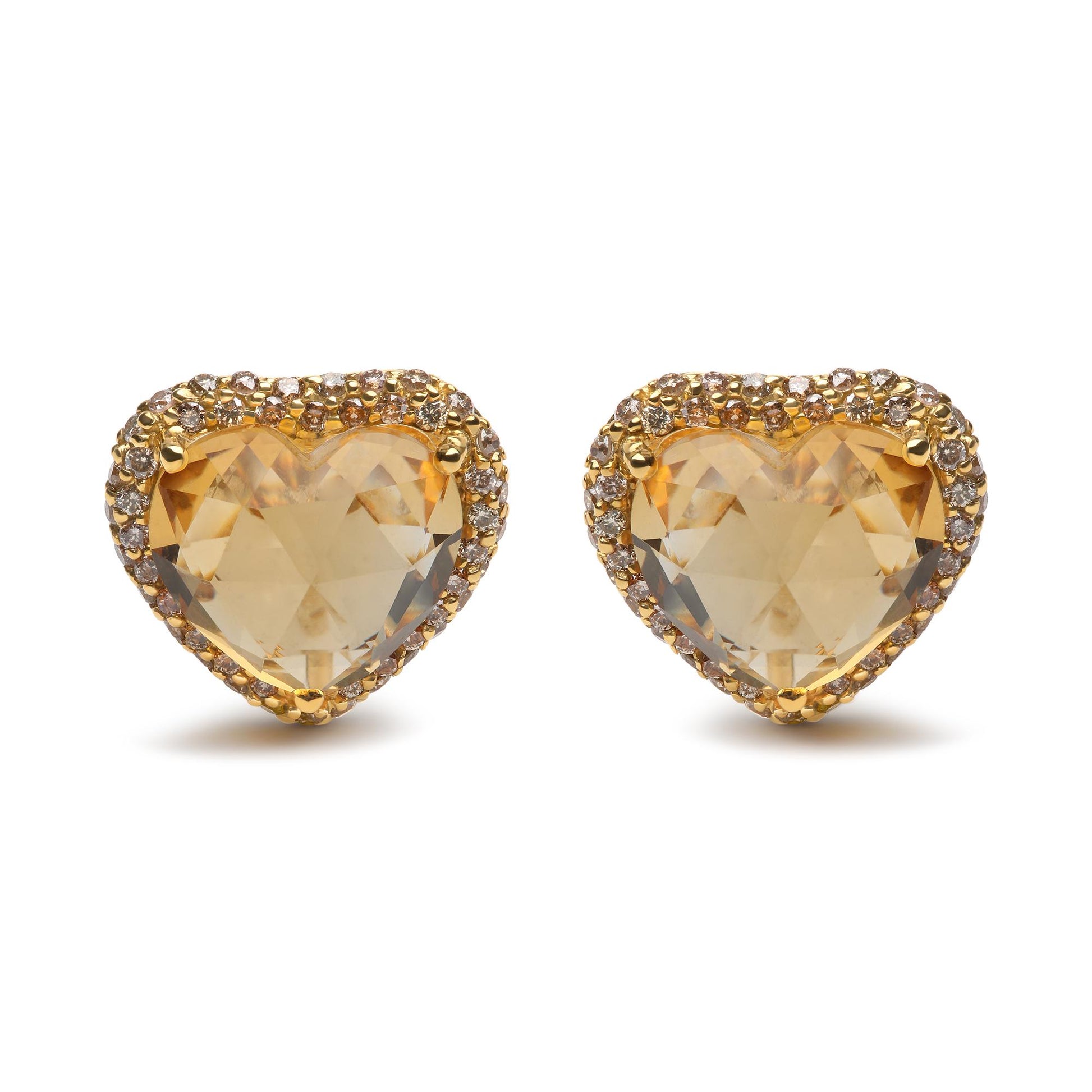 Front view of yellow metal heart-shaped earrings with yellow heart-shaped gemstones surrounded by small round brown gemstones in prong settings.