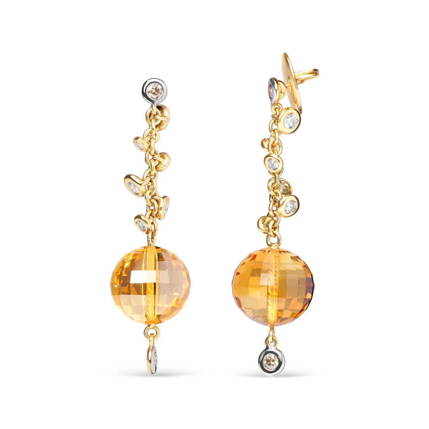 Front-facing view of a pair of yellow metal drop earrings featuring round bezel-set white and brown gemstones along the chain and a large faceted yellow gemstone with drilled setting at the bottom.