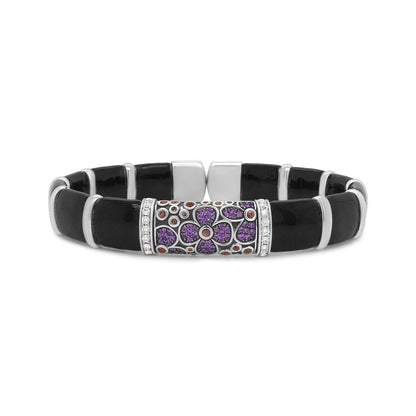Front view of a white metal bracelet with black segments and a central bar featuring purple and orange round gemstones set in floral patterns, accented by white round gemstones on either side.