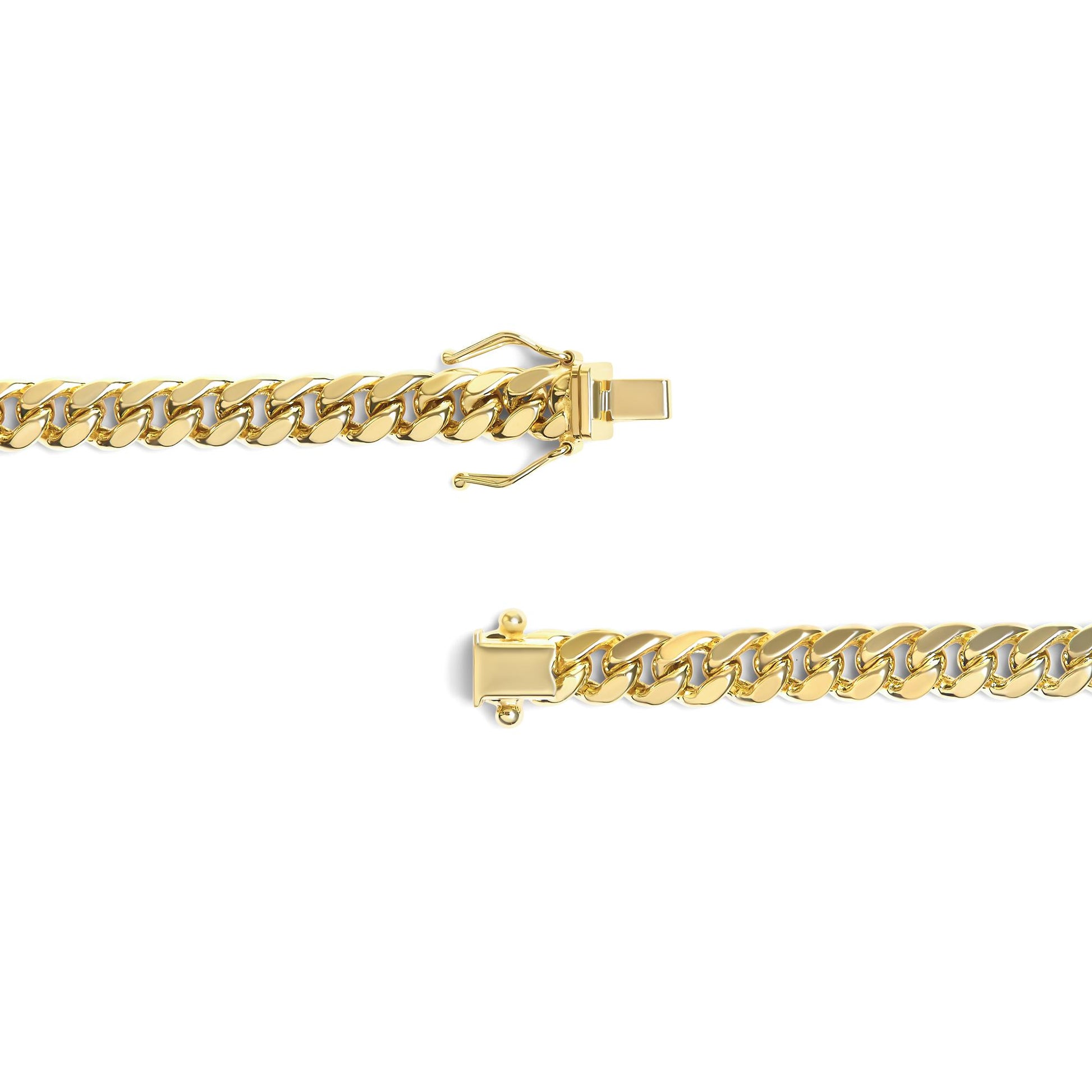 Close-up top view of a yellow metal chain with clasp opened, isolated on white background.