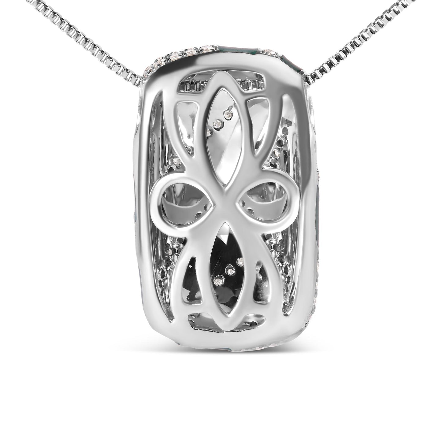 Close-up front view of a white metal necklace pendant with an intricate cut-out design and round white gemstones set inside.