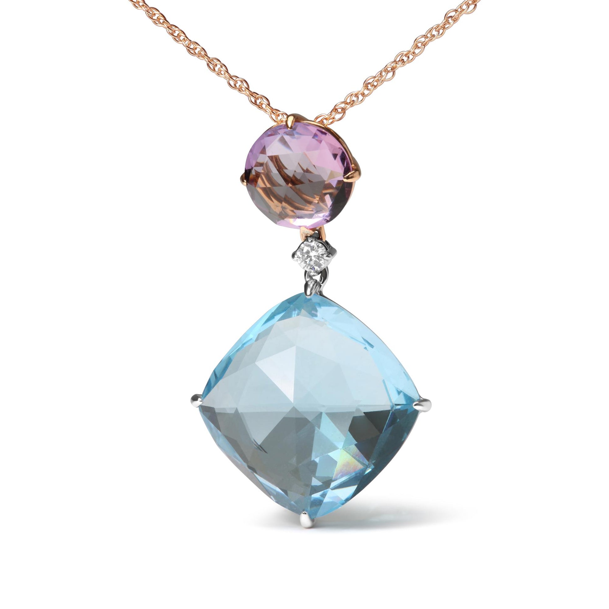 Close-up front view of a necklace with a rose-colored chain featuring a pink round gemstone at the top, a small white round gemstone in the middle, and a larger blue cushion-shaped gemstone at the bottom.