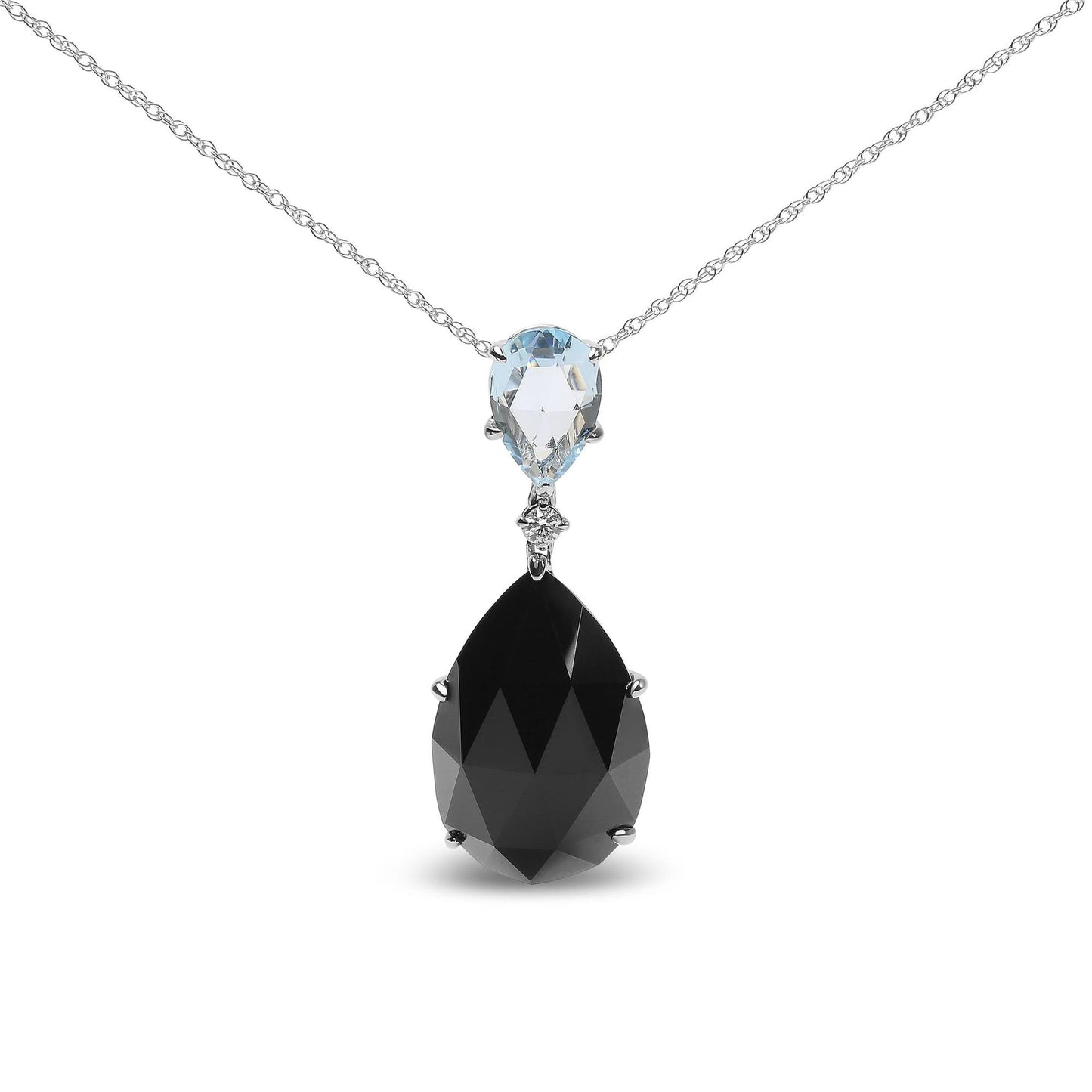 Front view of a white metal necklace with a pear-shaped blue gemstone at the top, a small round white gemstone below it, and a larger pear-shaped black gemstone hanging beneath.